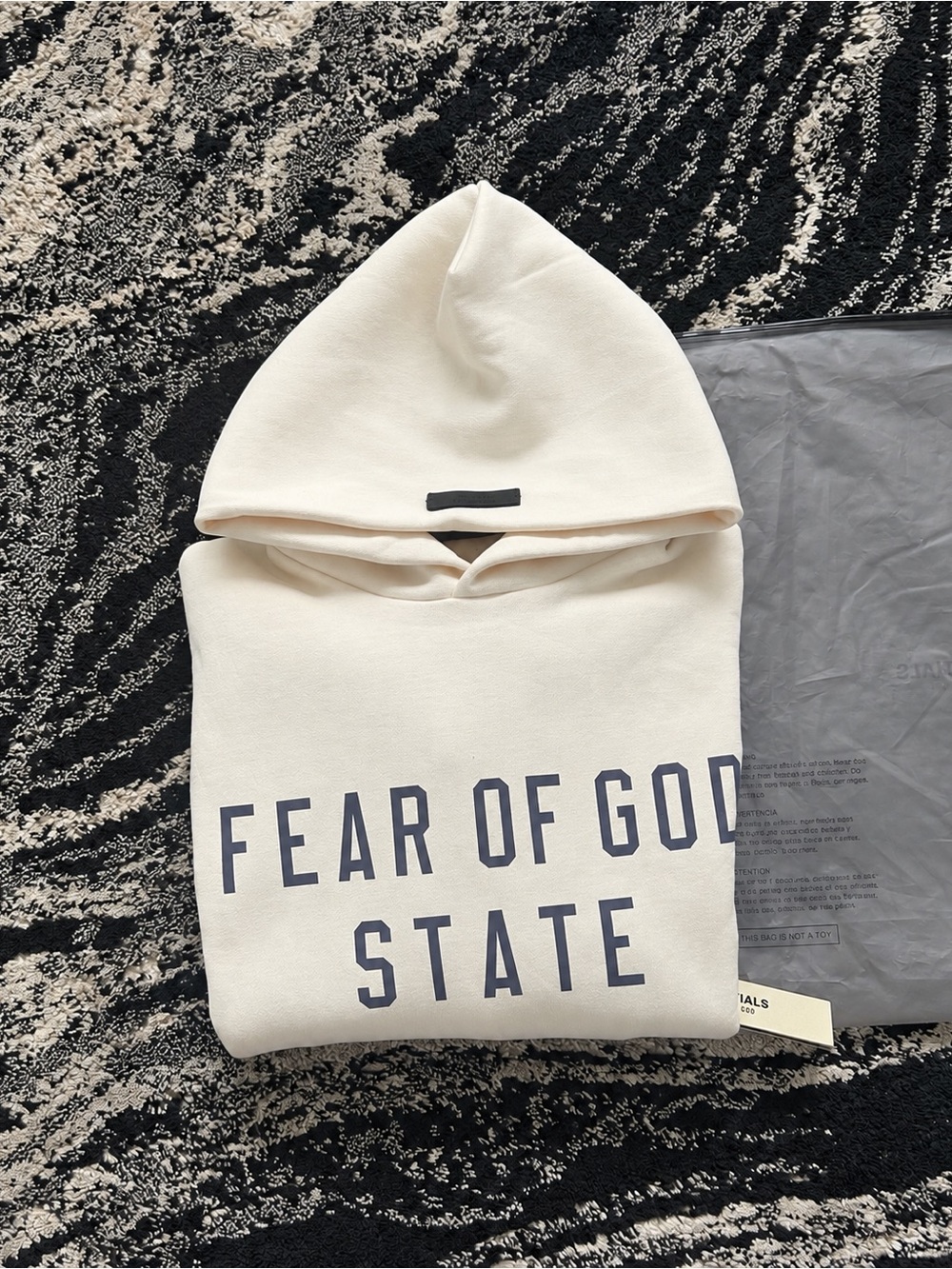 Essentials eggshell Crewneck Sweatshirt with Blue text
